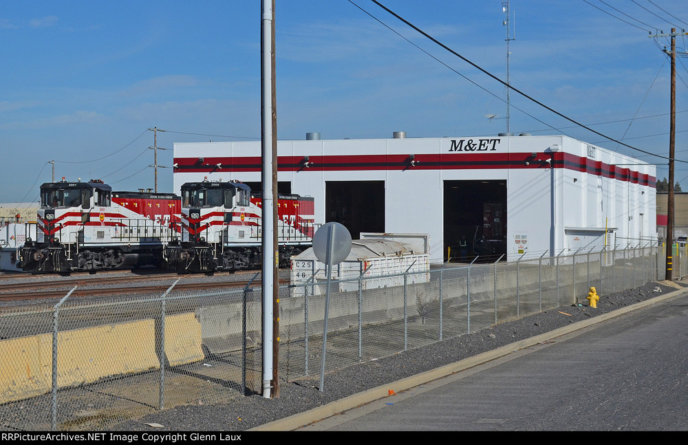 MET 2000 & 2001 sit in front of the Modesto & Empire Traction Co. locomotive shop